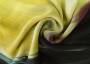 Ткань шифон желто-черного оттенка с размытым рисунком