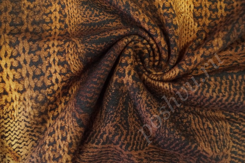 Ткань трикотаж темно-оранжевого оттенка с узором