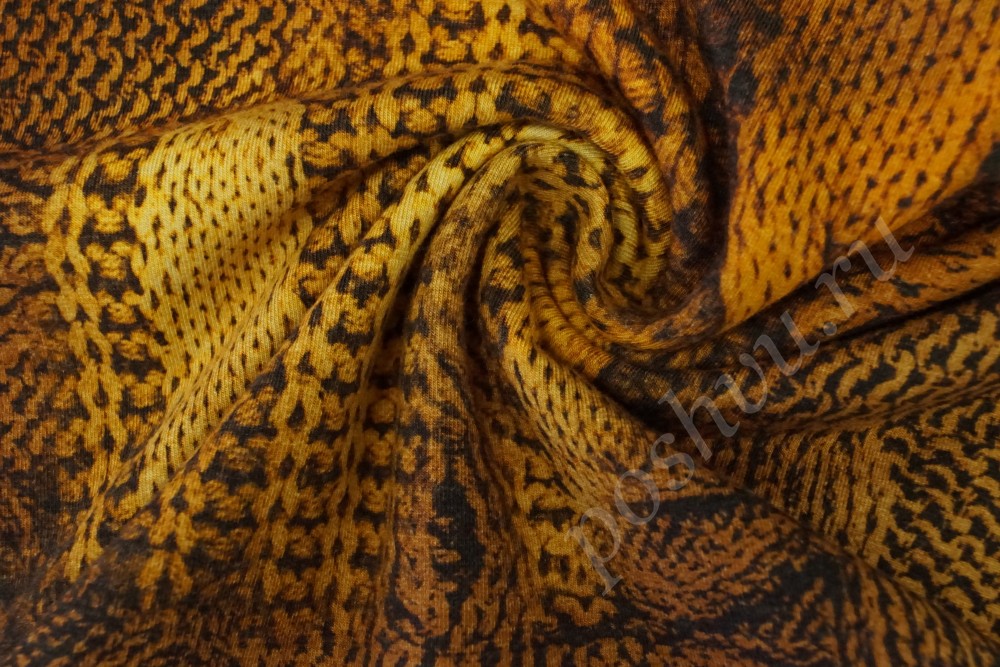 Ткань трикотаж в желто-коричневом оттенке с узором
