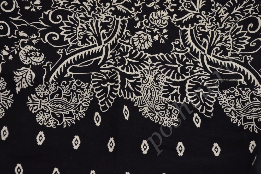 Штапельная ткань черного цвета с белым орнаметом