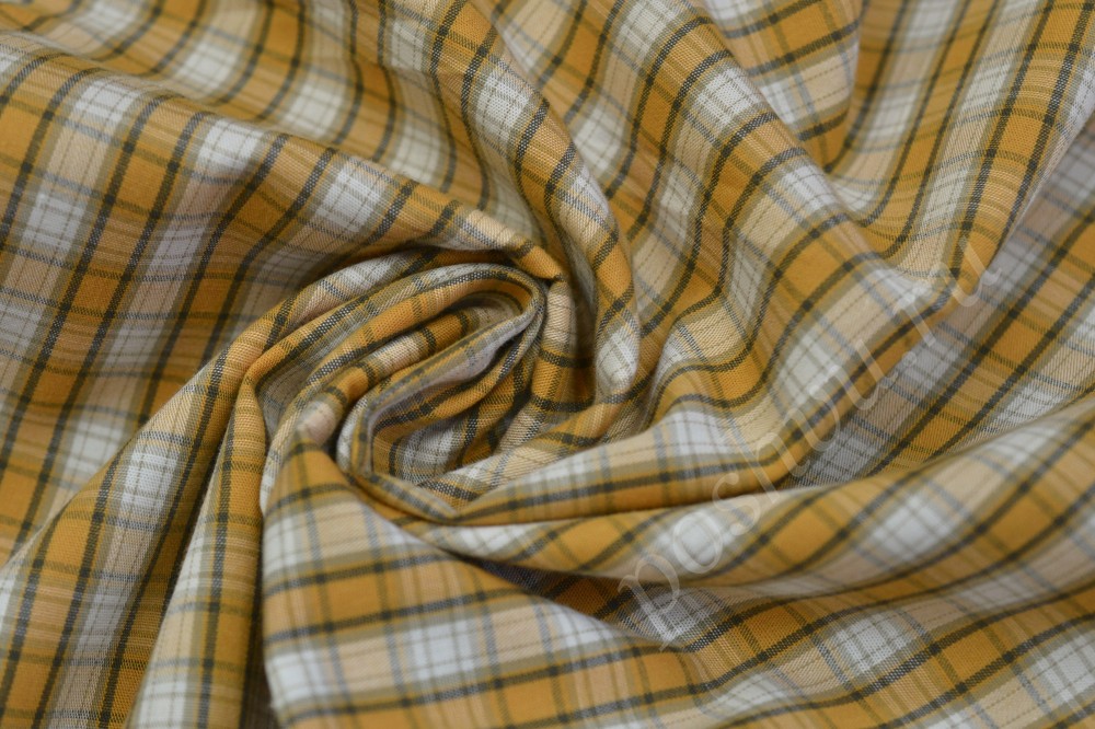 Сорочечная пестротканная ткань белого оттенка в  серо-желтую клетку