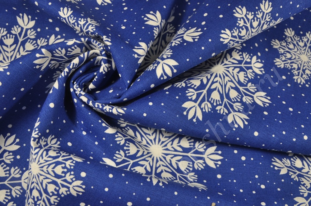 Полульняная ткань синего цвета со снежинками