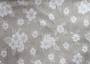 Портьерная ткань жаккард  PRINTEMPS букетики белых цветов на сером фоне (раппорт 37х35см)