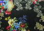 Ткань трикотаж-креп черного оттенка в разноцветные цветы