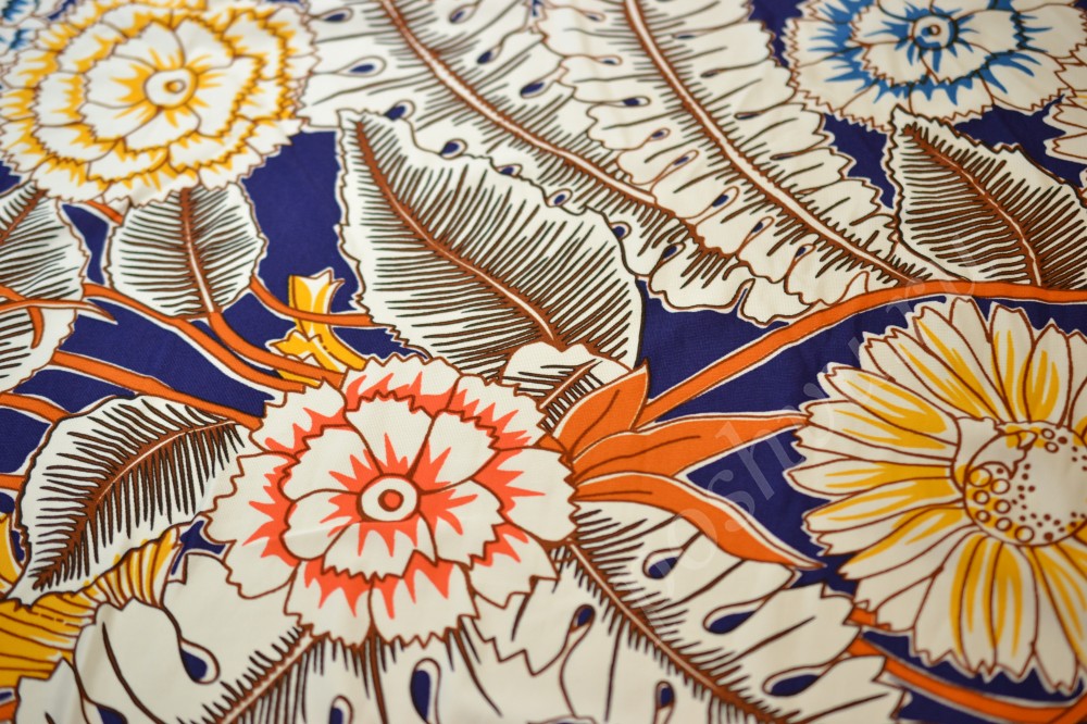 Ткань трикотаж синего цвета в светлый флористический узор