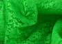 Яркая гипюровая ткань зелёного цвета