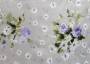 Портьерная ткань рогожка NELLO букетики лиловых цветов на сером фоне