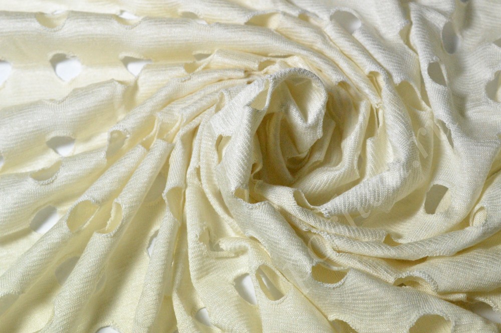 Ткань рубашечная  кремового цвета с круглыми дырочками с добавлением эластана