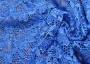 Воздушная гипюровая ткань голубого цвета