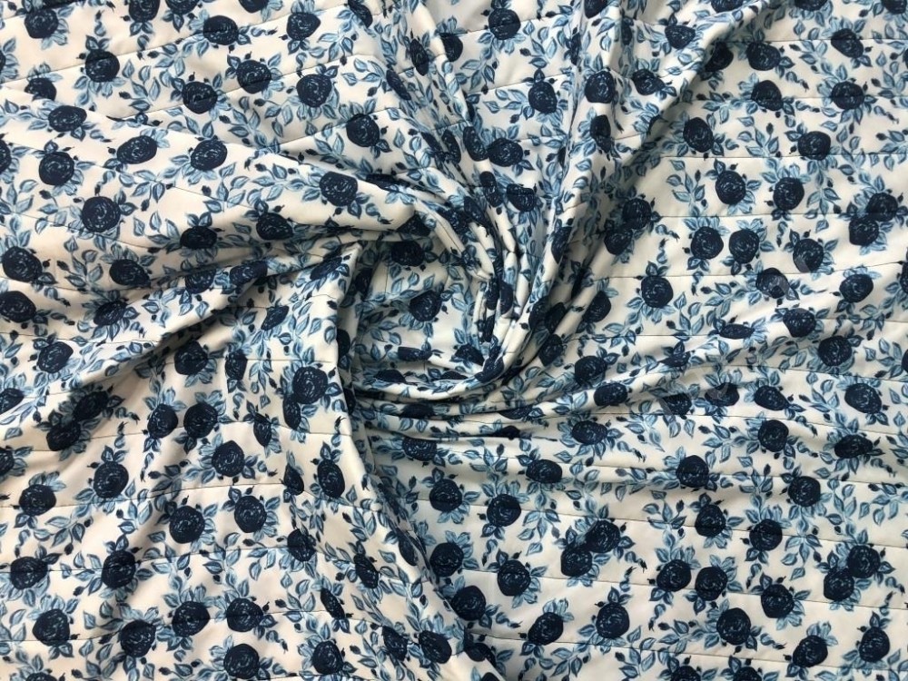Курточная стеганая ткань бело-голубого цвета