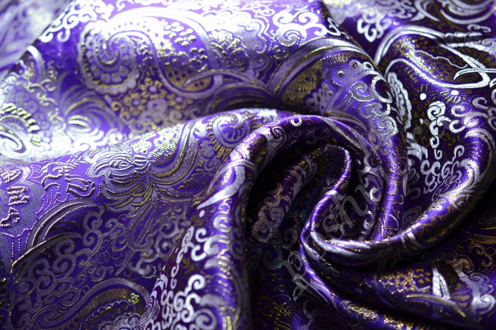 Костюмная ткань фиолетового оттенка в вышитый узор