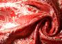 Костюмная ткань ярко-красного оттенка с вышитым серебристым узором