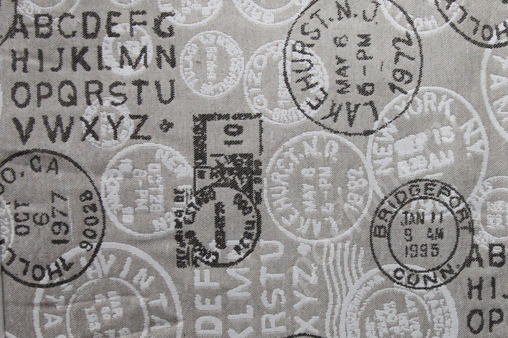 Мебельная ткань гобелен TRAVEL надписи и почтовые штампы в коричневых тонах (раппорт 69х35см)