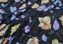 Трикотажная ткань черного цвета с цветочным принтом