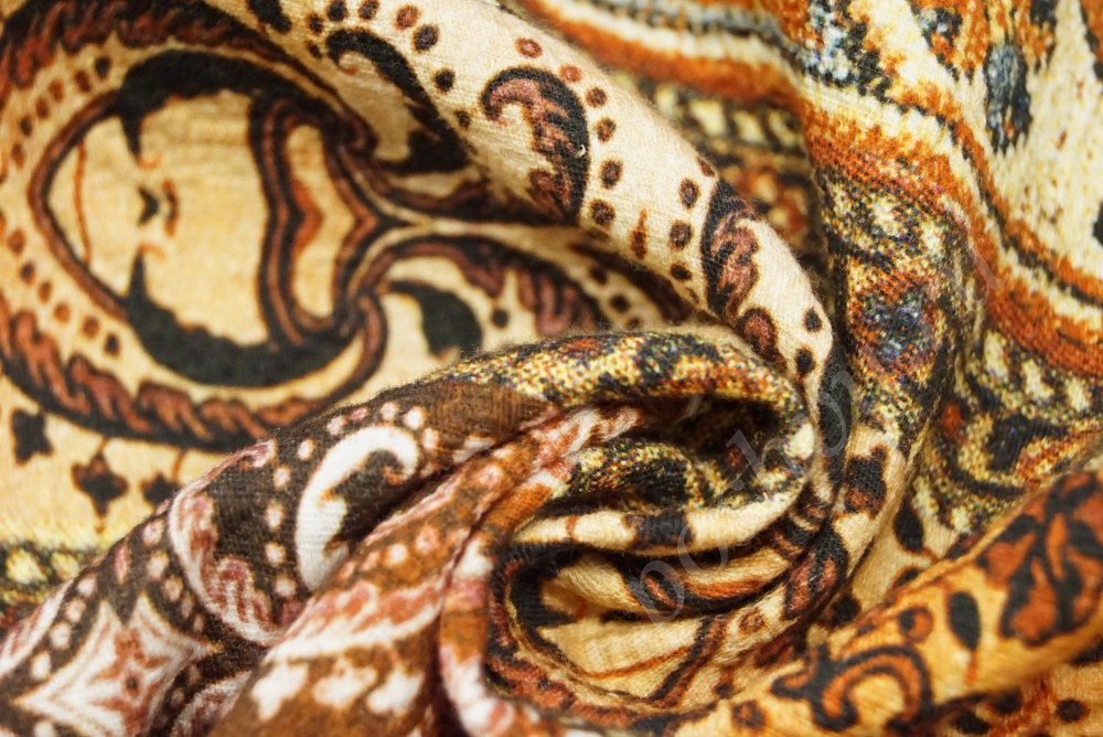 Ткань жаккард в оранжево-коричневом оттенке с этническим рисунком