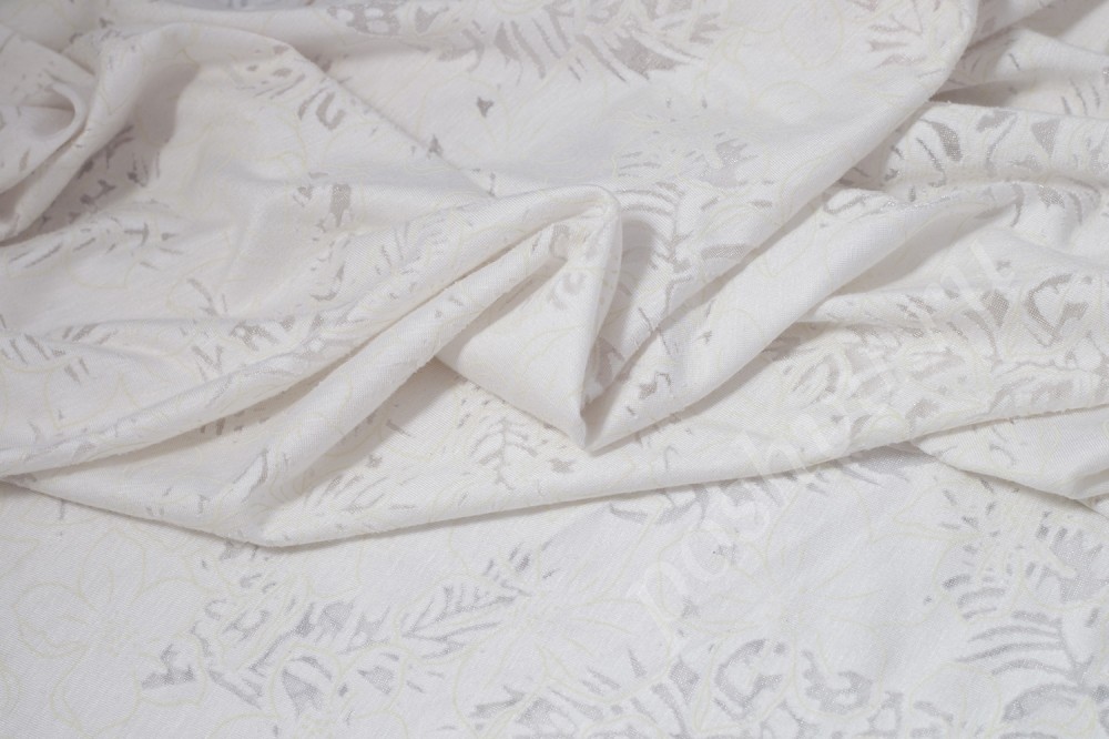 Трикотажная ткань белого цвета с необычным принтом