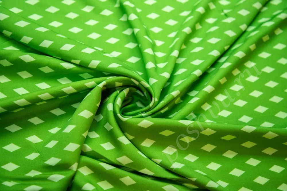 Штапельная ткань зеленого цвета в ромбики с черным бордюром (157г/м2)