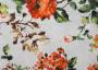 Портьерная ткань рогожка CATALINA оранжевые цветы на светлом фоне в акварельном стиле