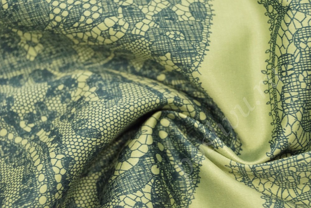 Ткань плательная  зеленого оттенка в кружевной узор с эластаном