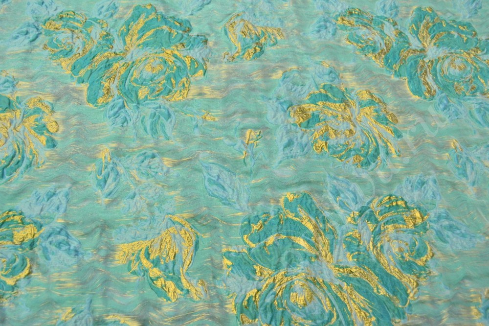 Ткань жаккард голубого цвета в бирюзово-золотистых цветах