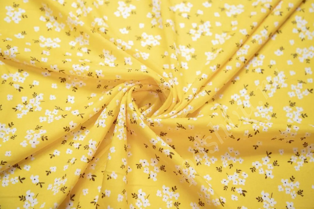 Штапельная ткань на желтом фоне мелкие цветочки (92г/м2)