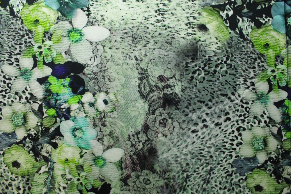 Ткань трикотаж Cavalli в флористический узор белого,черного и зеленого оттенков