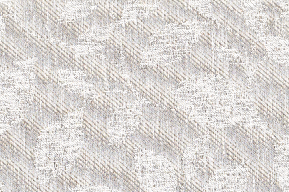 Портьерная ткань жаккард BOTANIC бежевого цвета с выработкой листья