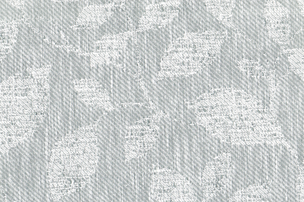 Портьерная ткань жаккард BOTANIC серо-голубого цвета с выработкой листья