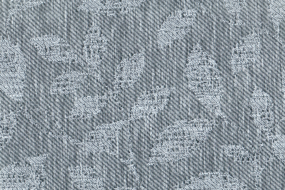 Портьерная ткань жаккард BOTANIC серо-синего цвета с выработкой листья