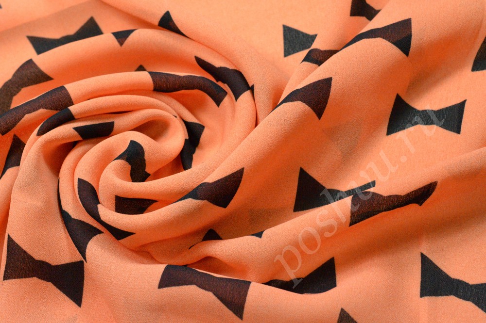Ткань шифон набивной оранжевого оттенка в черные банты