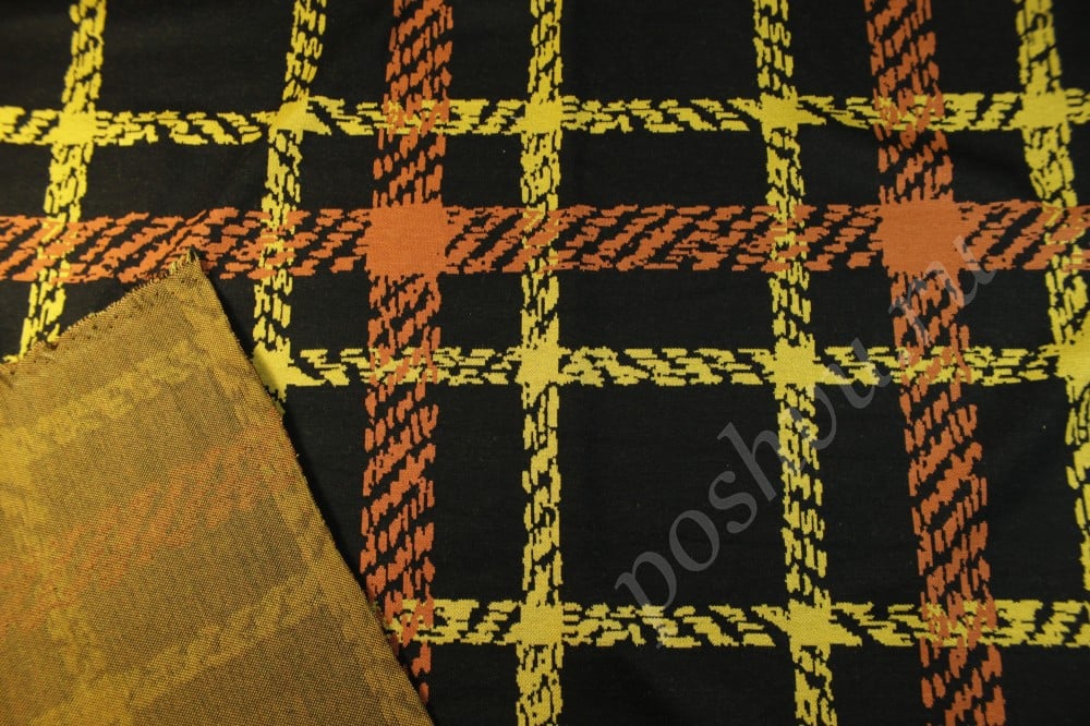 Трикотажная ткань черного цвета в оранжево-желтую клетку