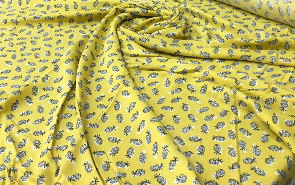 Ткань вискоза набивная желтого цвета с ананасами