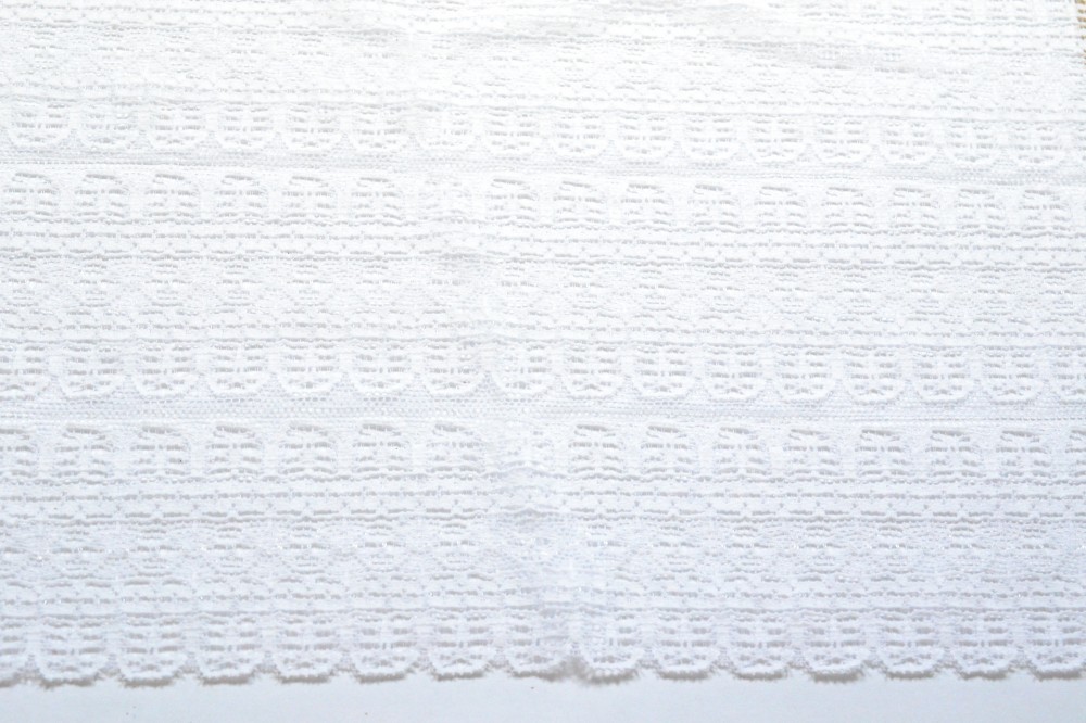Ткань кружево стрейч белого цвета с узором
