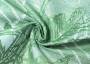 Жаккардовая льняная ткань зеленого оттенка с узором