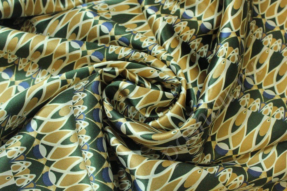 Ткань шелк зеленого оттенка с бежевым узором