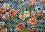 Ткань шелк серо-синего оттенка в роскошный цветочный рисунок