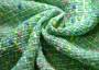Костюмная ткань шанелька  насыщенного зеленого оттенка с узором меланж