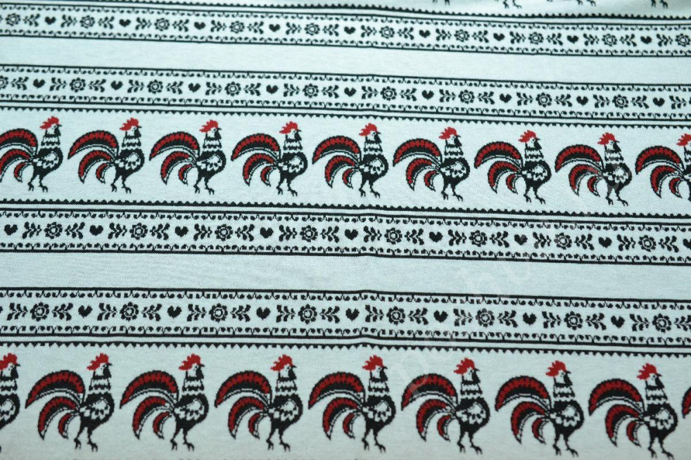 Трикотажная вискозная ткань на светло-сером фоне красные петушки с черной вышивкой в полоску