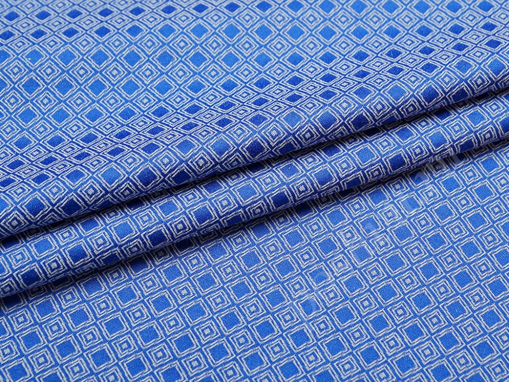 Ткань жаккард, нежный геометрический узор на голубом фоне