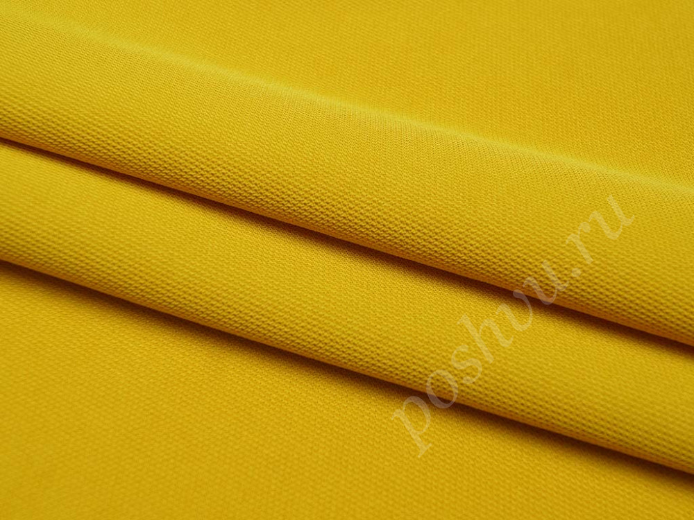 Плательная однотонная ткань ярко-желтого цвета