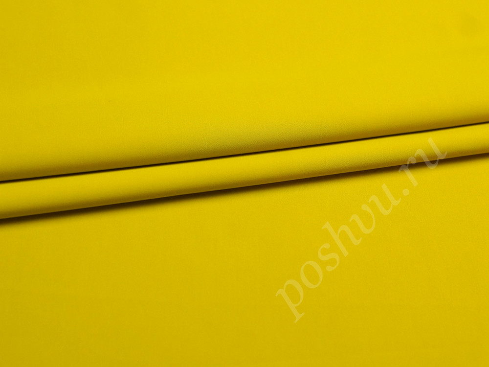 Плательная ткань желтого цвета