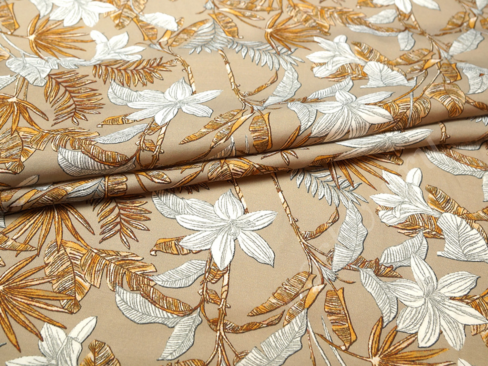 Блузочно-плательная ткань с растительным принтом на коричневом фоне